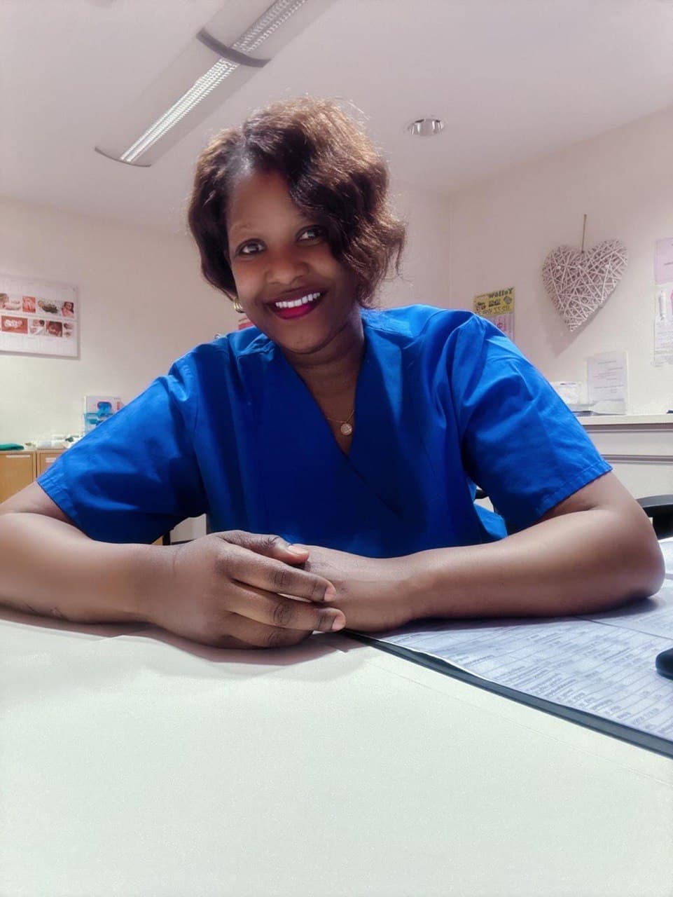 Portrait of midwife Margaret Birungi